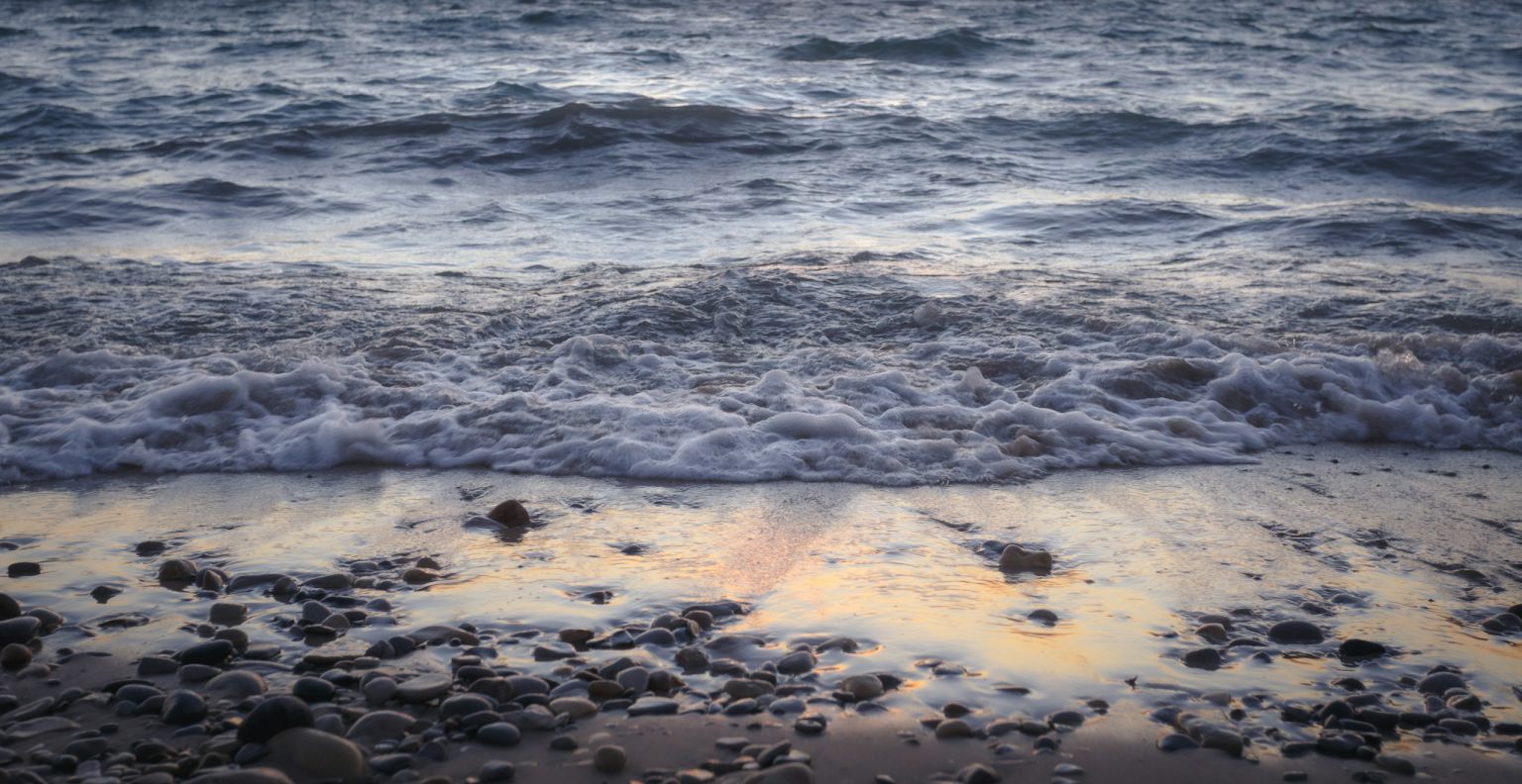 Sunset reflections across the Lake Michigan shoreline